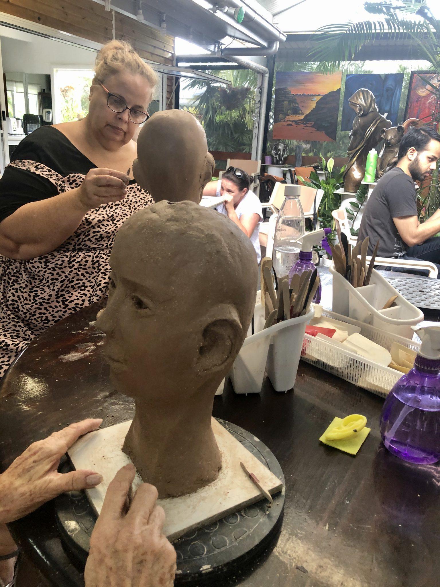 Beginners learning the art of clay sculpting - Georgettes Art