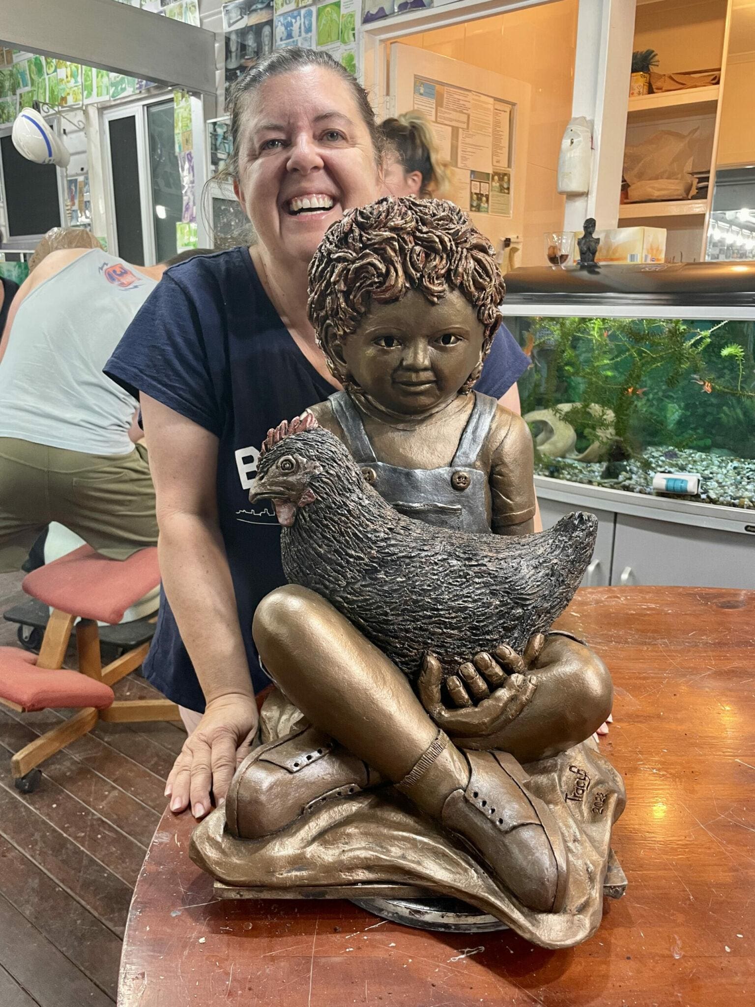 Grandchild sculpted in Clay by Tracy Art