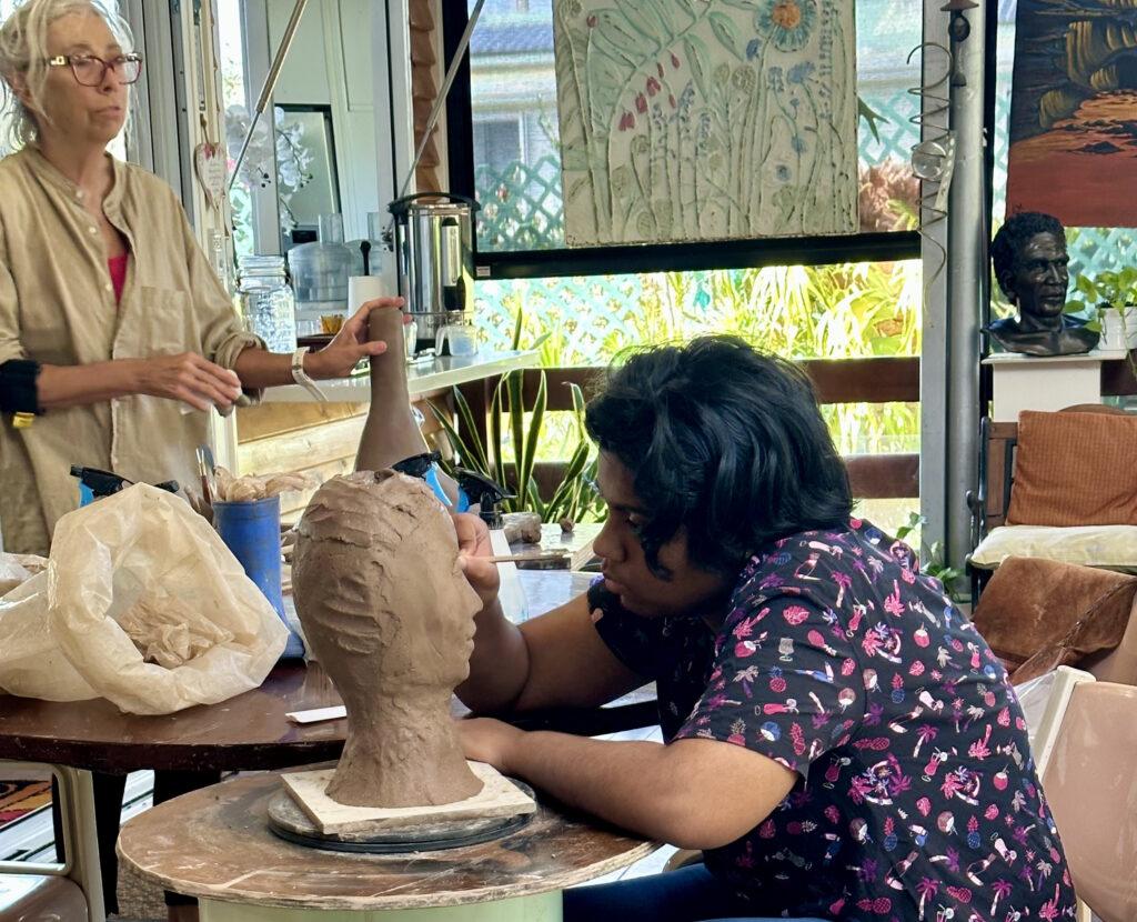 Beginners learning the art of clay sculpting - Georgettes Art